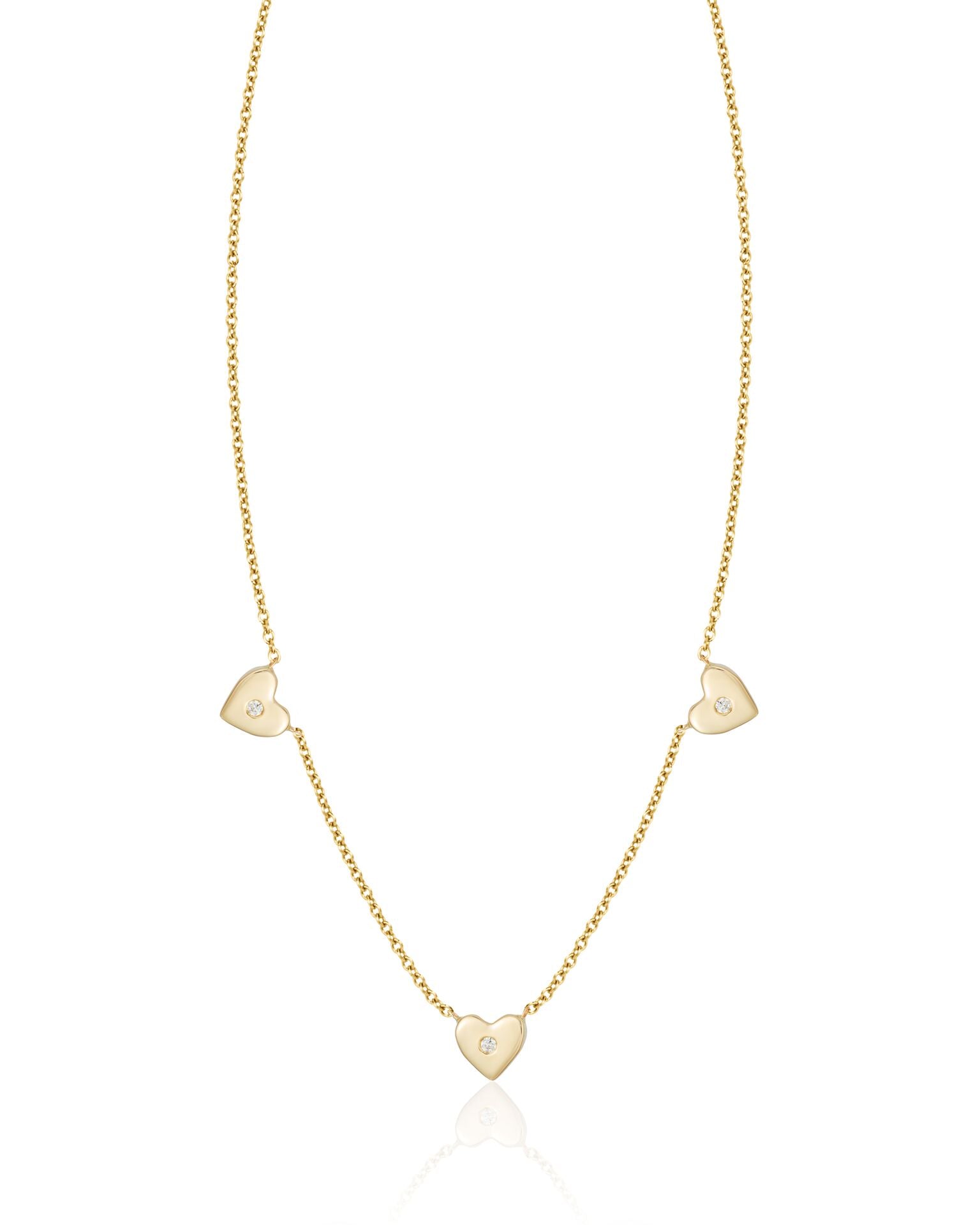 heart necklace with three diamonds