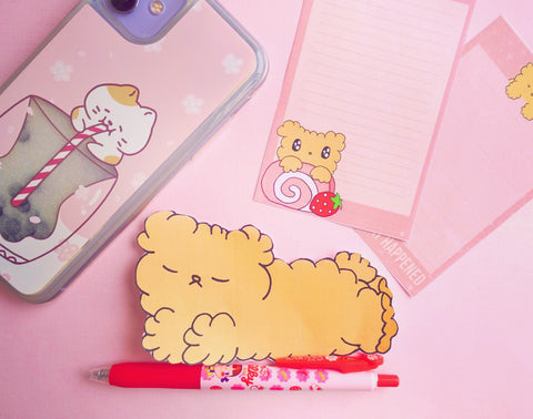 osito a cute little teddy bear lying down with stationery