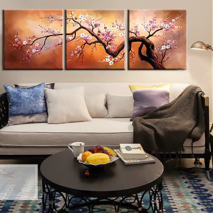 A 3 piece canvas painting with a cherry tree