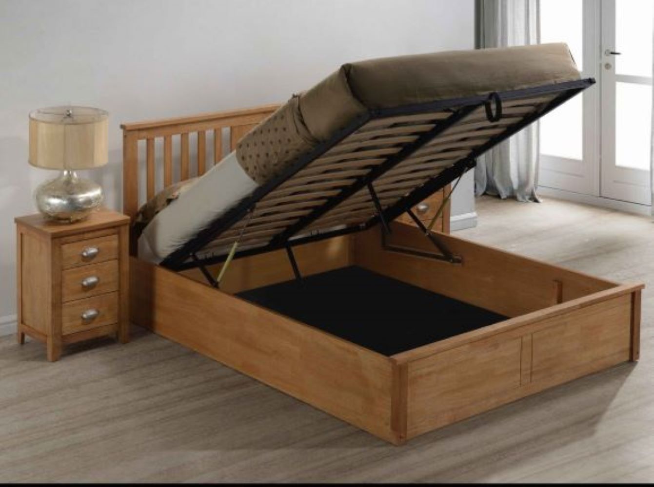 An image of Eaton Wooden Ottoman Storage Bed