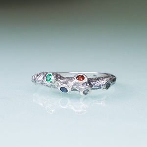 carved and cast sterling silver family ring coral and barnacle ring with garnet, emerald and sapphire by hkm jewelry