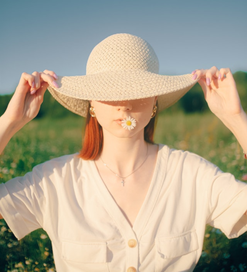 woman in wide-brimmed hat