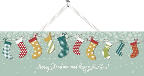 Holiday sign depicting a string of colorful, patterned Christmas stockings and a festive message