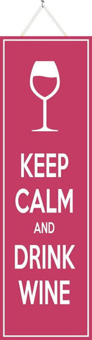Sign with keep calm and drink wine quote in white letters on pink background