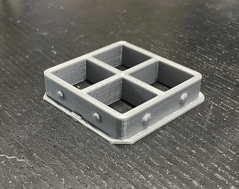 The 3D Printed BECMv1 - (Buffalo e-NABLE Crisis Mask) filter insert piece showing the design