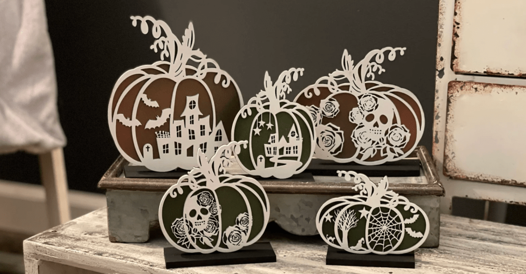 Laser cut halloween decoration pumpkins with skulls