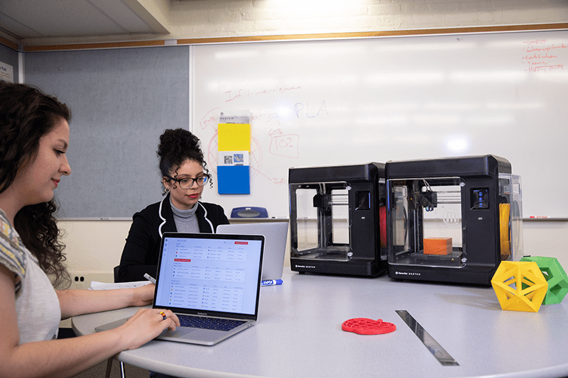 Teachers working with the MakerBot SKETCH 3D printers