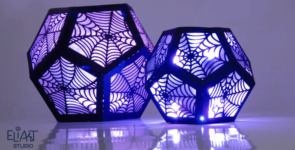 Laser Cut paper lanterns with spiderweb shapes