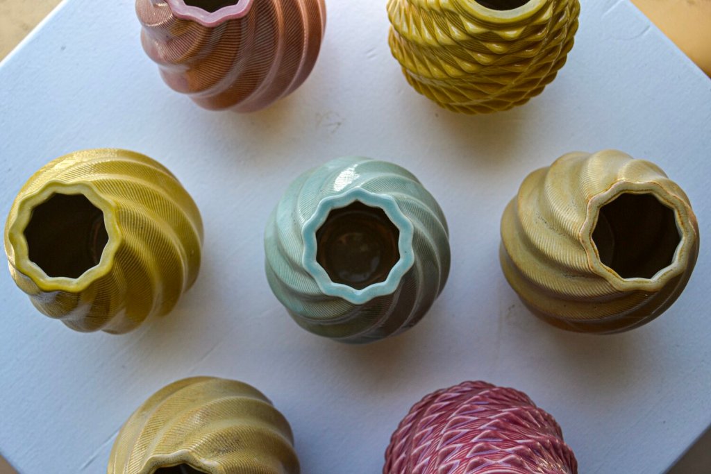 colorful 3D printed ceramic pots produced on the 3D PotterBot