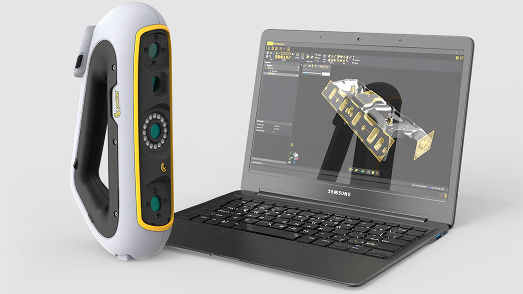 3D scanner with a laptop showing what it 3D scanned