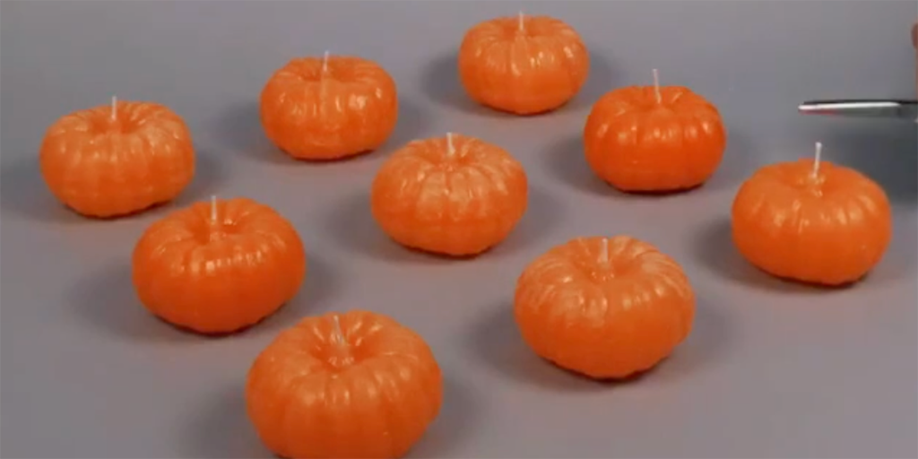 Pumpkin candles created with a Mayku FormBox vacuum former for Halloween