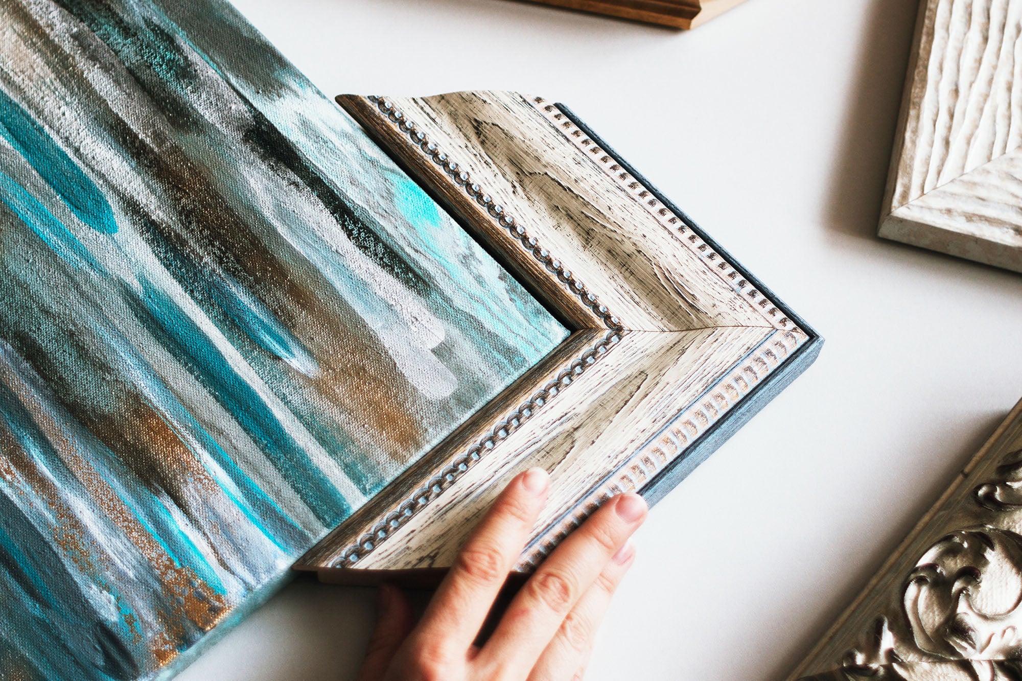 How do you frame canvas art