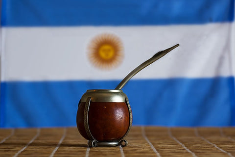 Argentina flag with mate and bombilla