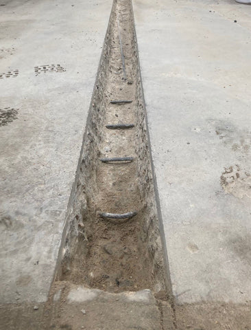 drainage channels in the concrete floor