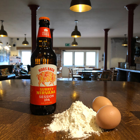 Surrey Nirvana beer bottle with flour and eggs