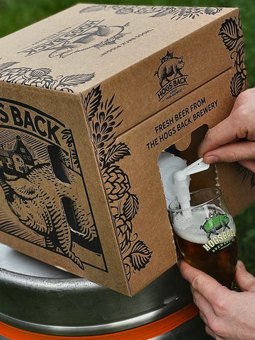 Pouring beer from a Piggin into a beer glass