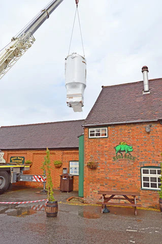 Beer vessel arriving at the brewery