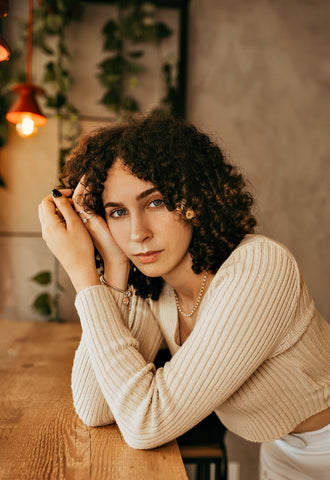 curly hair woman plants second day curly hair