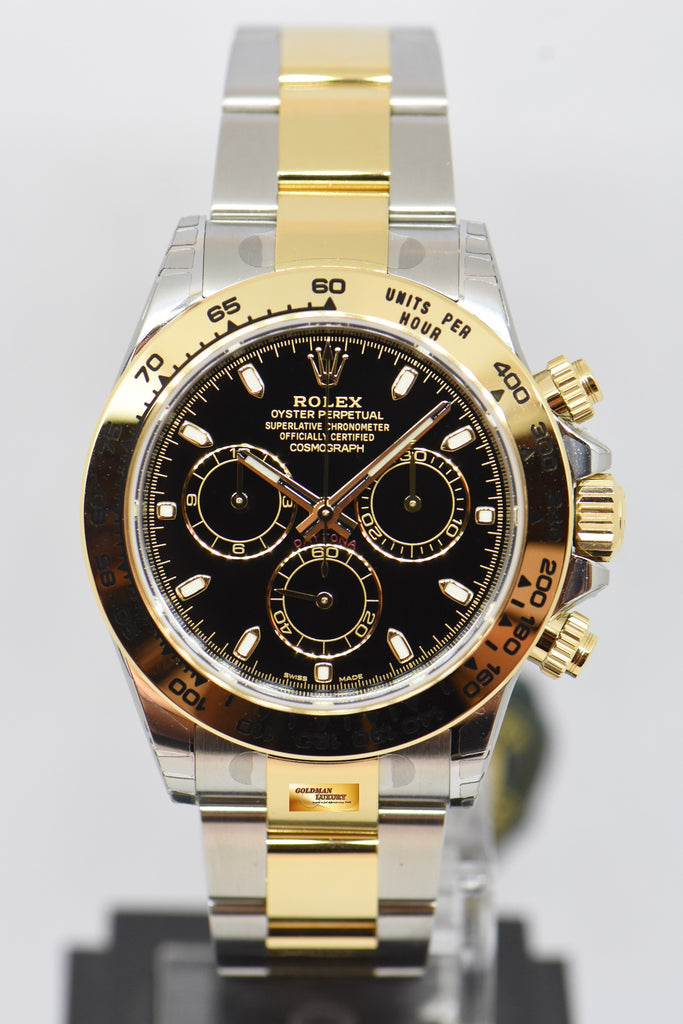 daytona half gold black dial