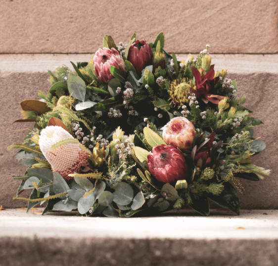 Blumenstrauß und Sterntaufe als Trauergeschenk