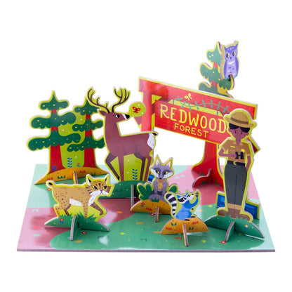 Assembled Redwood Forest Pop-out and Play kids activity kit, with puzzle pieces featuring colorful forest characters like a National Park Ranger, bobcat, deer, and raccoon.