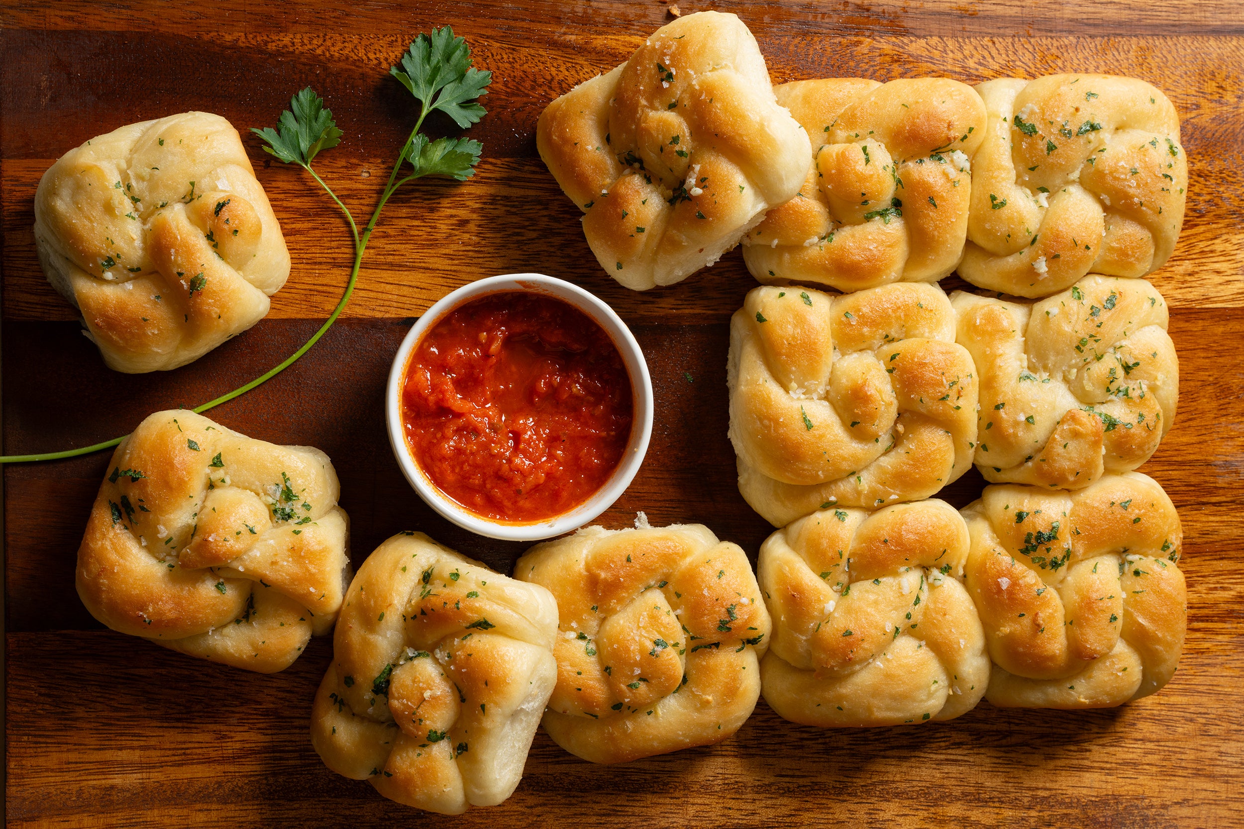 Garlic Knots with a marinara dipping sauce