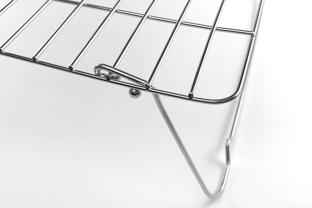 Close-up of the folding leg of the shelf