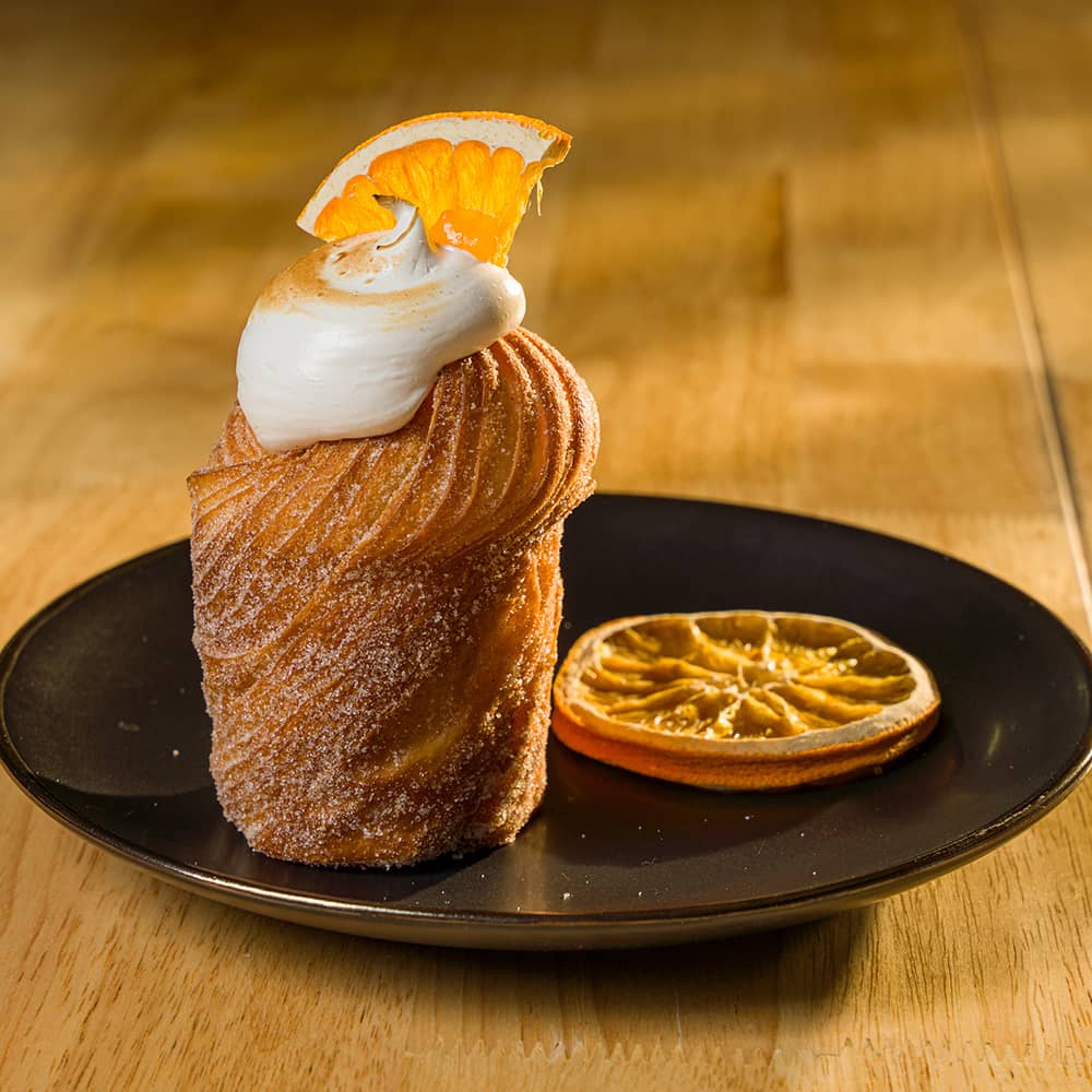 Cruffin served with dehydrated orange slice