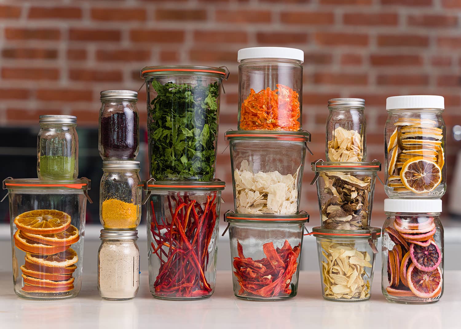 Jars of dehydrated fruit, vegetables and herbs