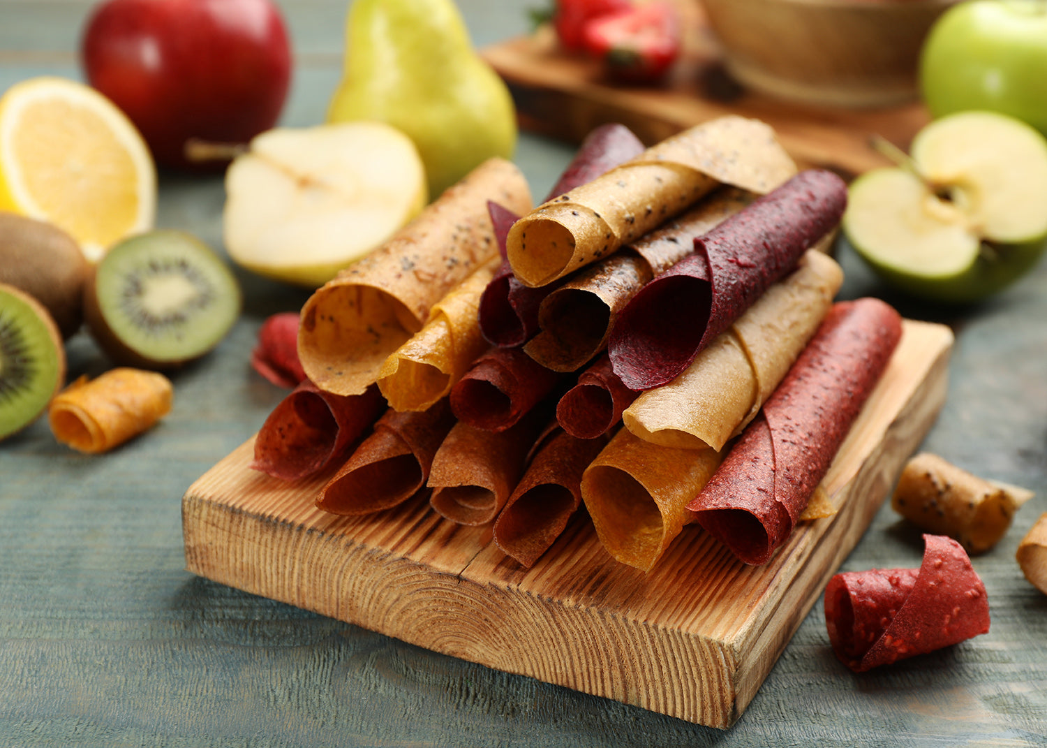 Various fruit leather and fresh fruit