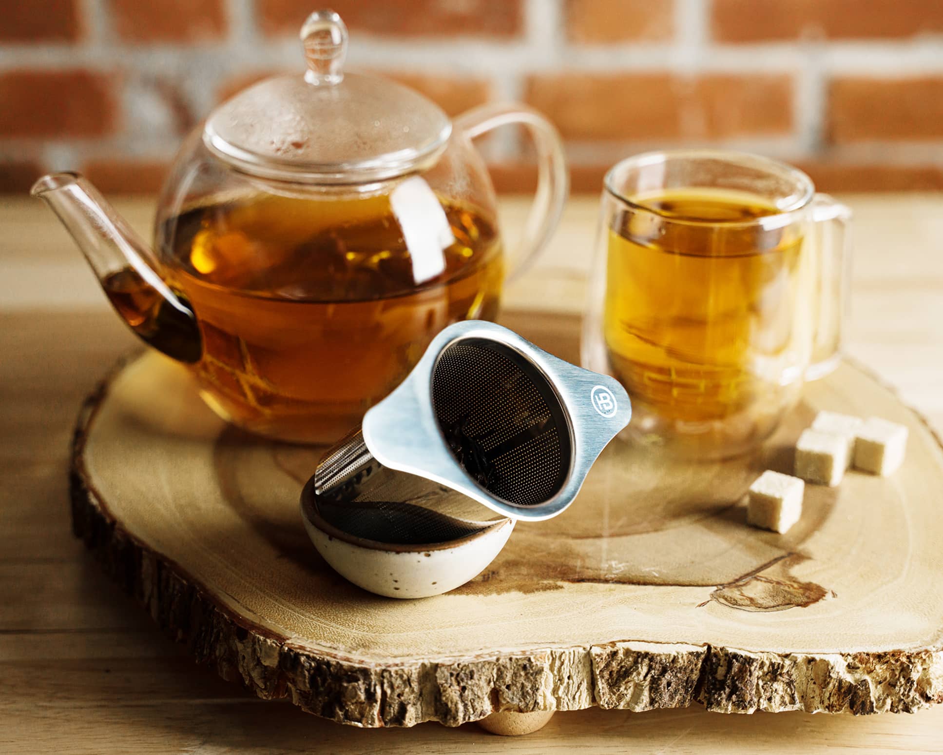 Mesh Tea Infuser with a glass tea pot and glass mug