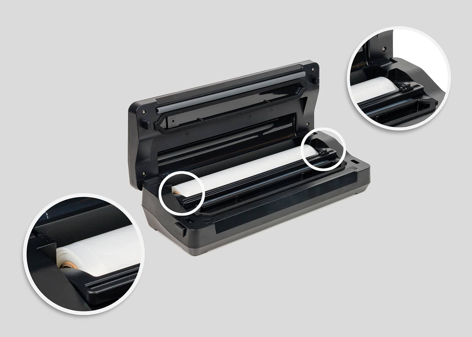 Inside the vacuum sealer, roll storage chamber and built-in cutter