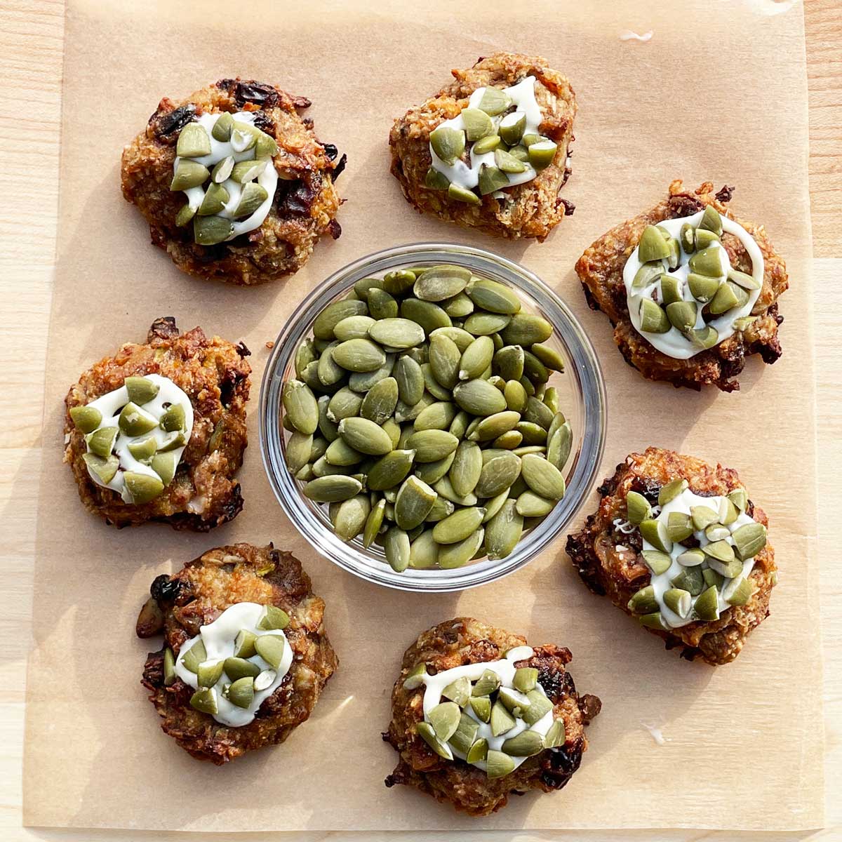 White chocolate grazed vegan cookies with pumpkin seed topping