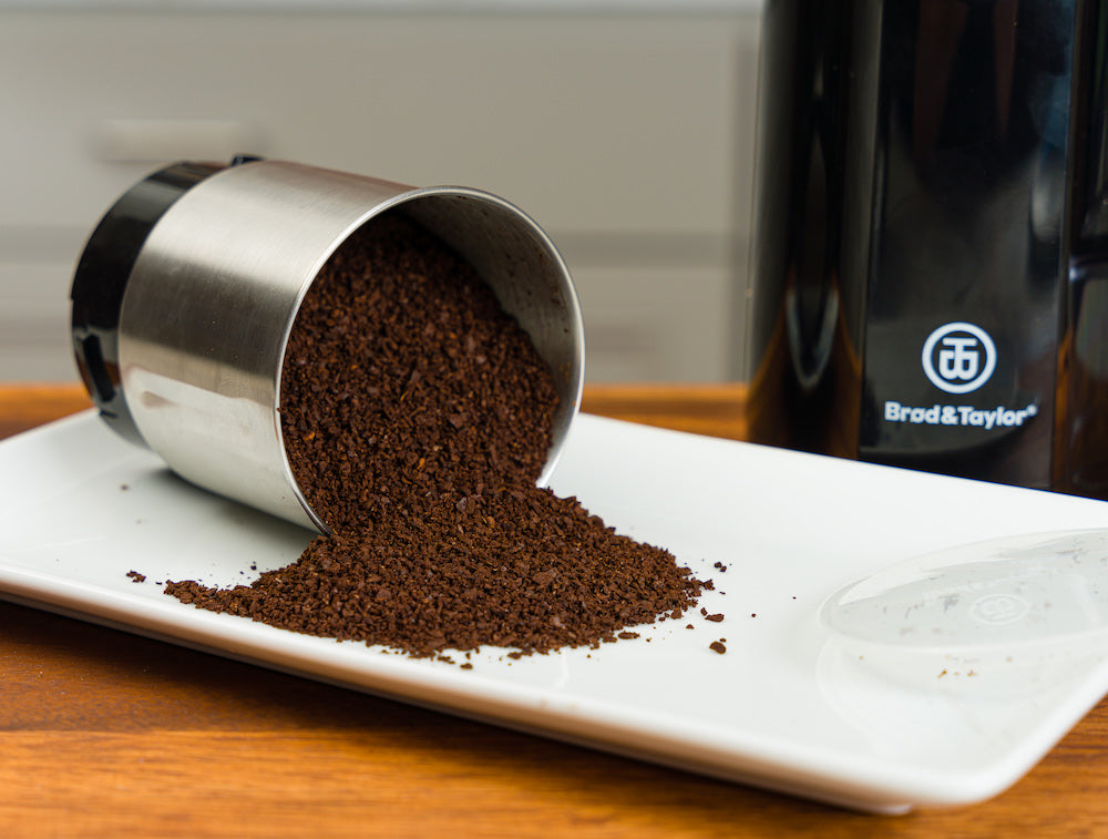 Coffee beans roasting and grinding in bulk