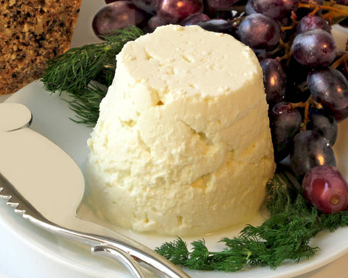 Fresh cheese with grapes