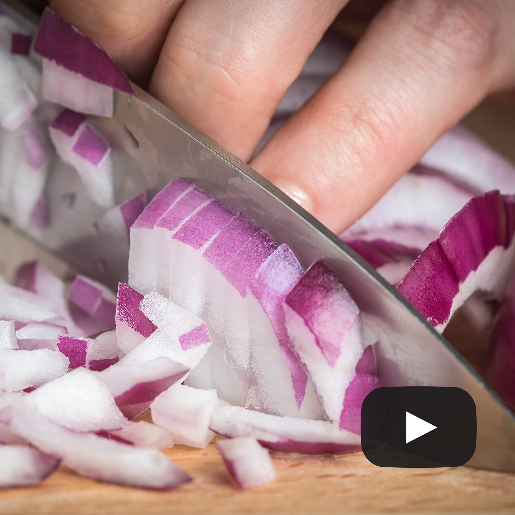 Chopping red onion