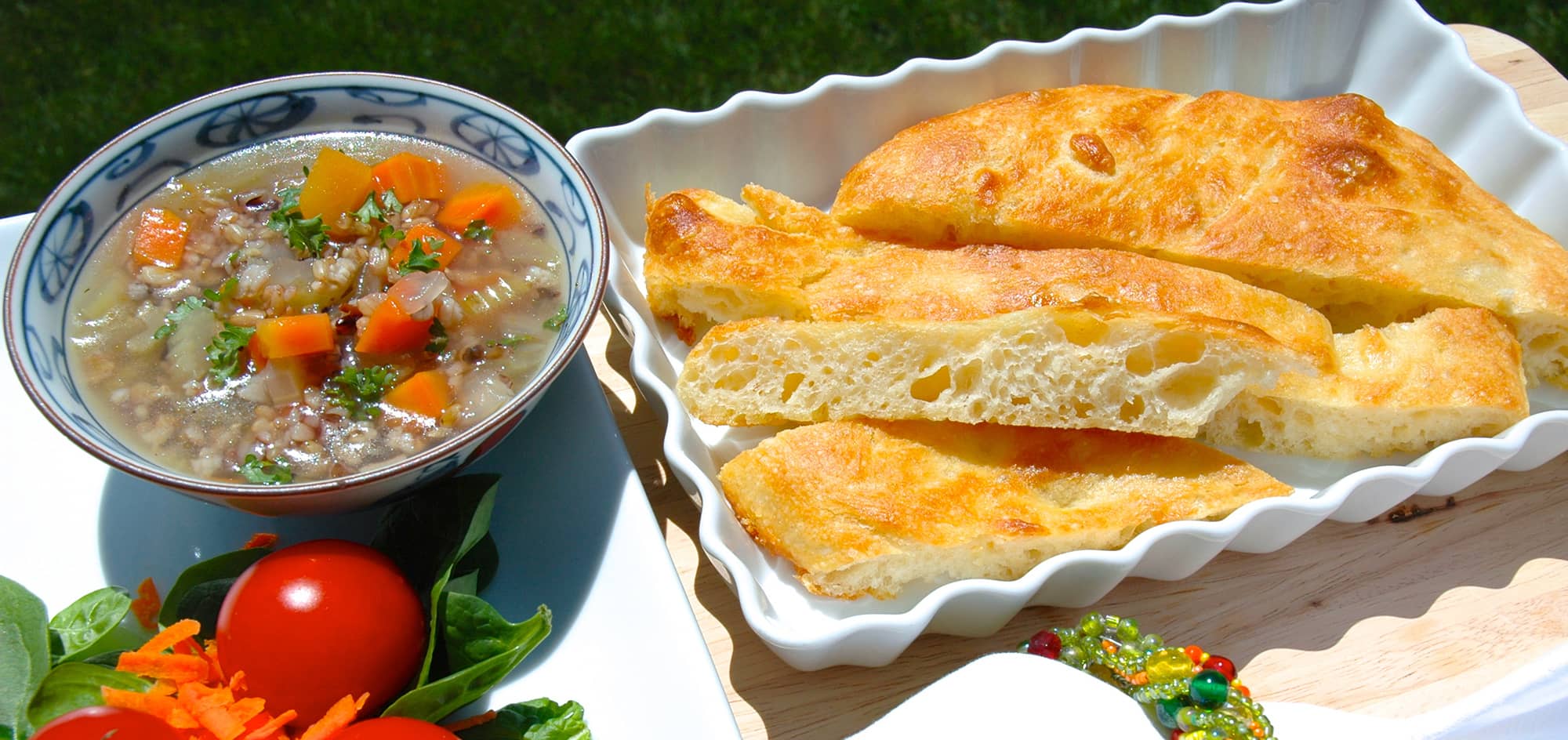 Sliced focaccia and soup