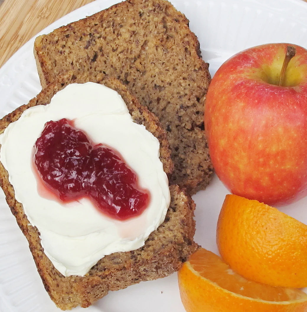 Gluten-Free Currant Oat Bread. Currant Oat Bread with cream cheese and jam.