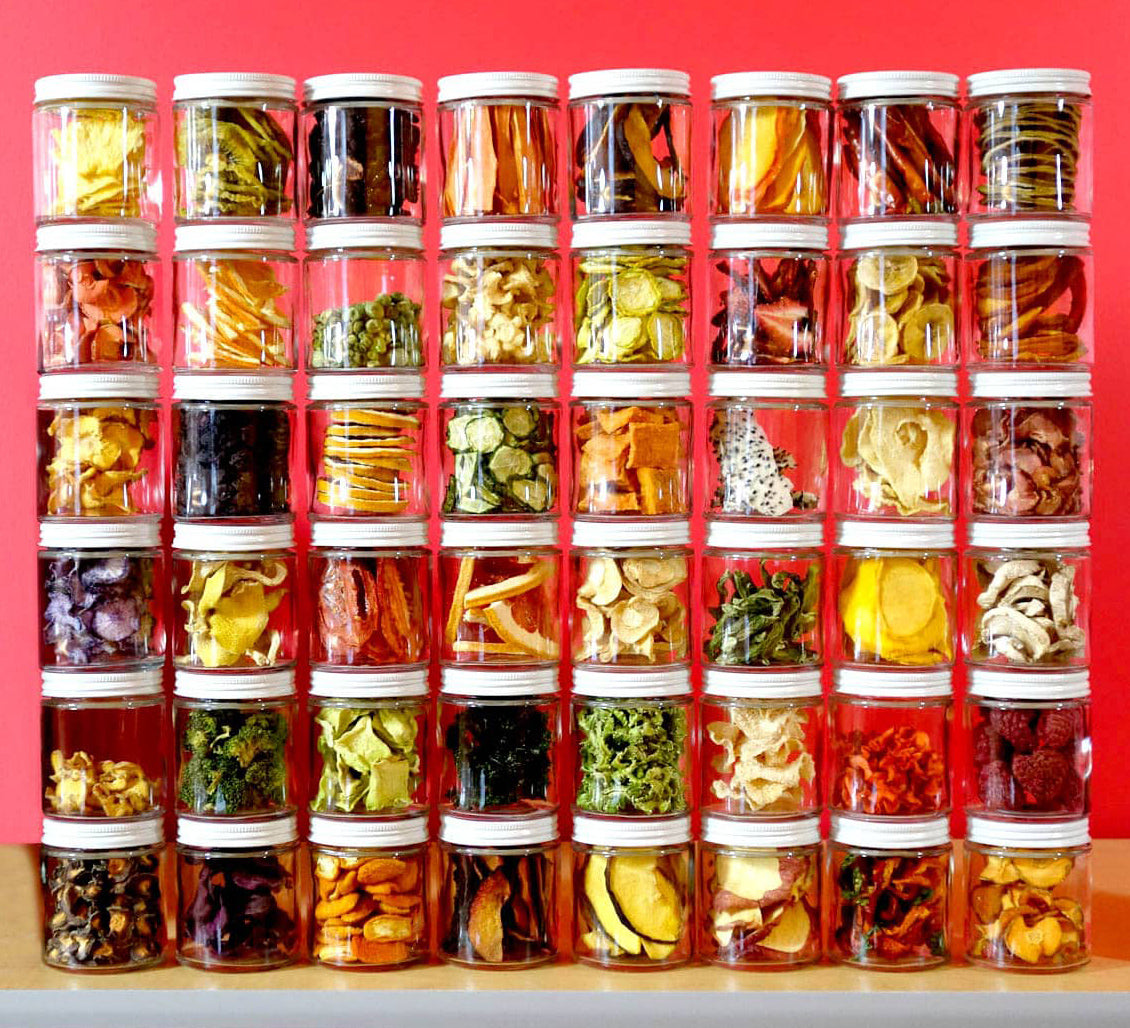 Multiple jars full of dehydrated vegetables