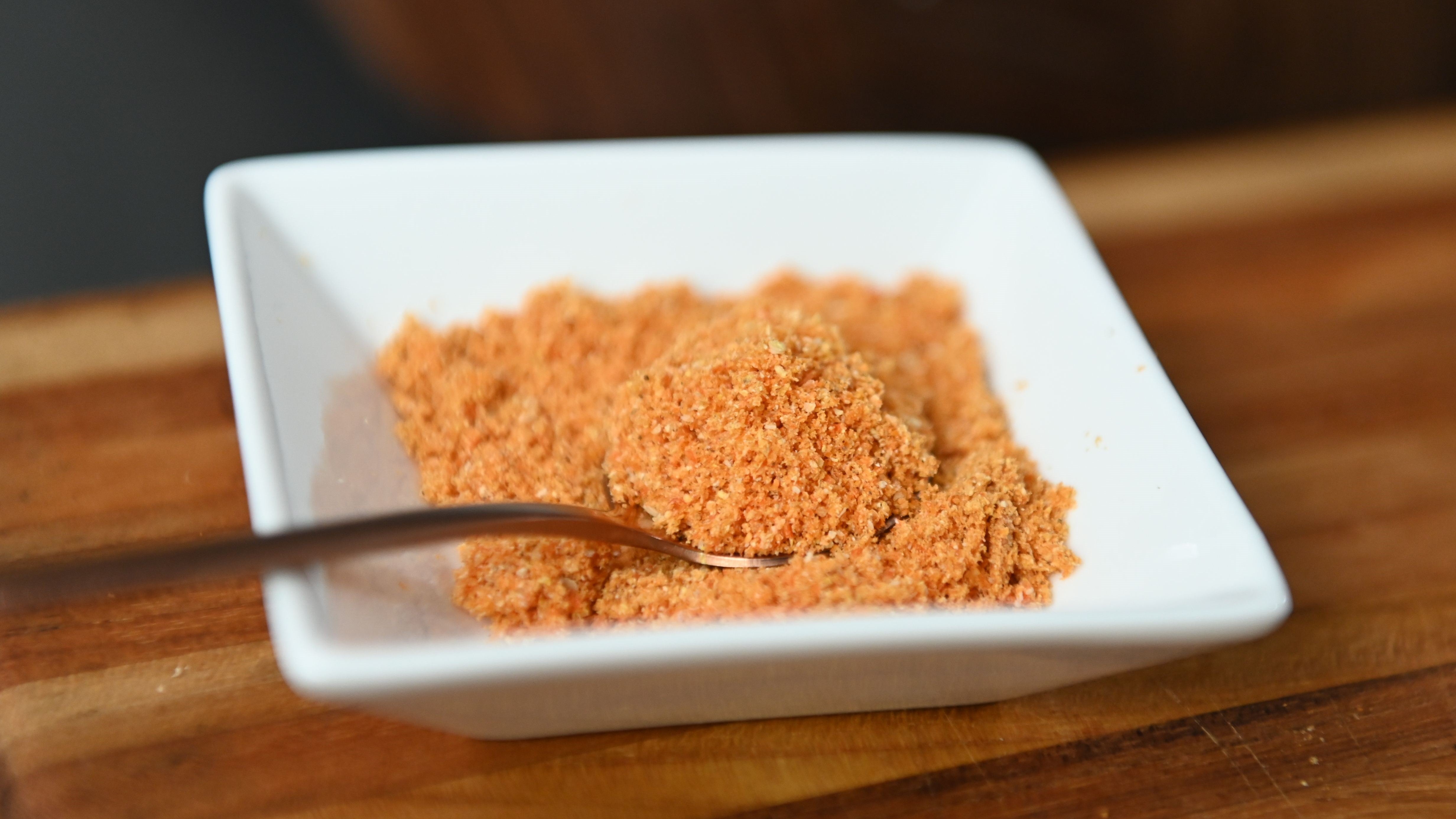 Spoonful of orange habanero powder