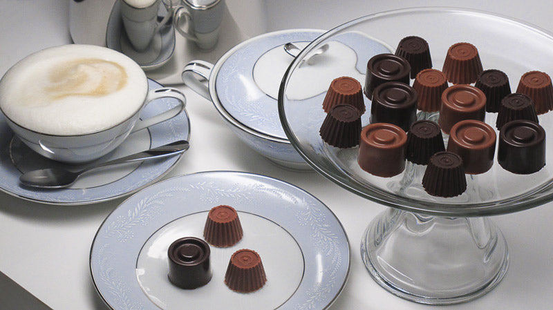 assortment of chocolate pieces on plates