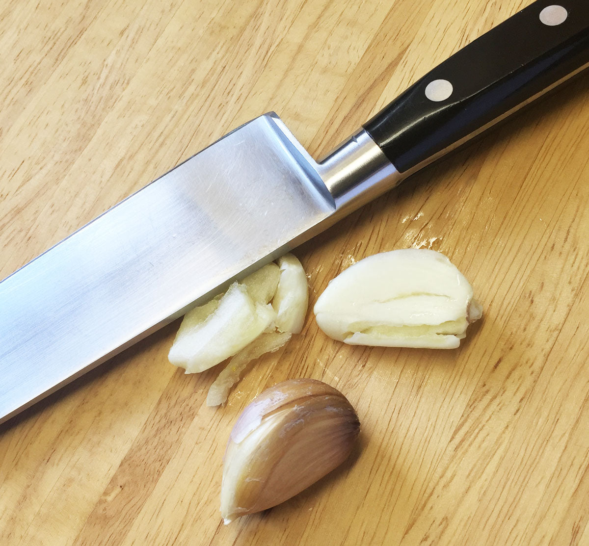 Crush the garlic with a knife