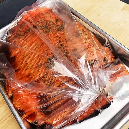 Marinate mix and salmon slices in a large plastic bag