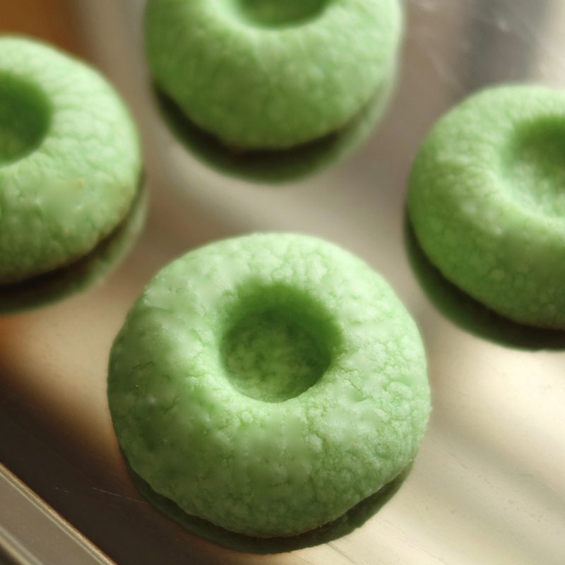 Green cookies colored with liquid natural food dye