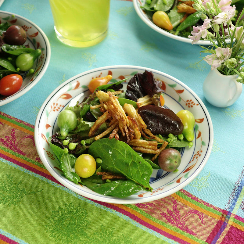 Green salad with the fried potatoes as toppings