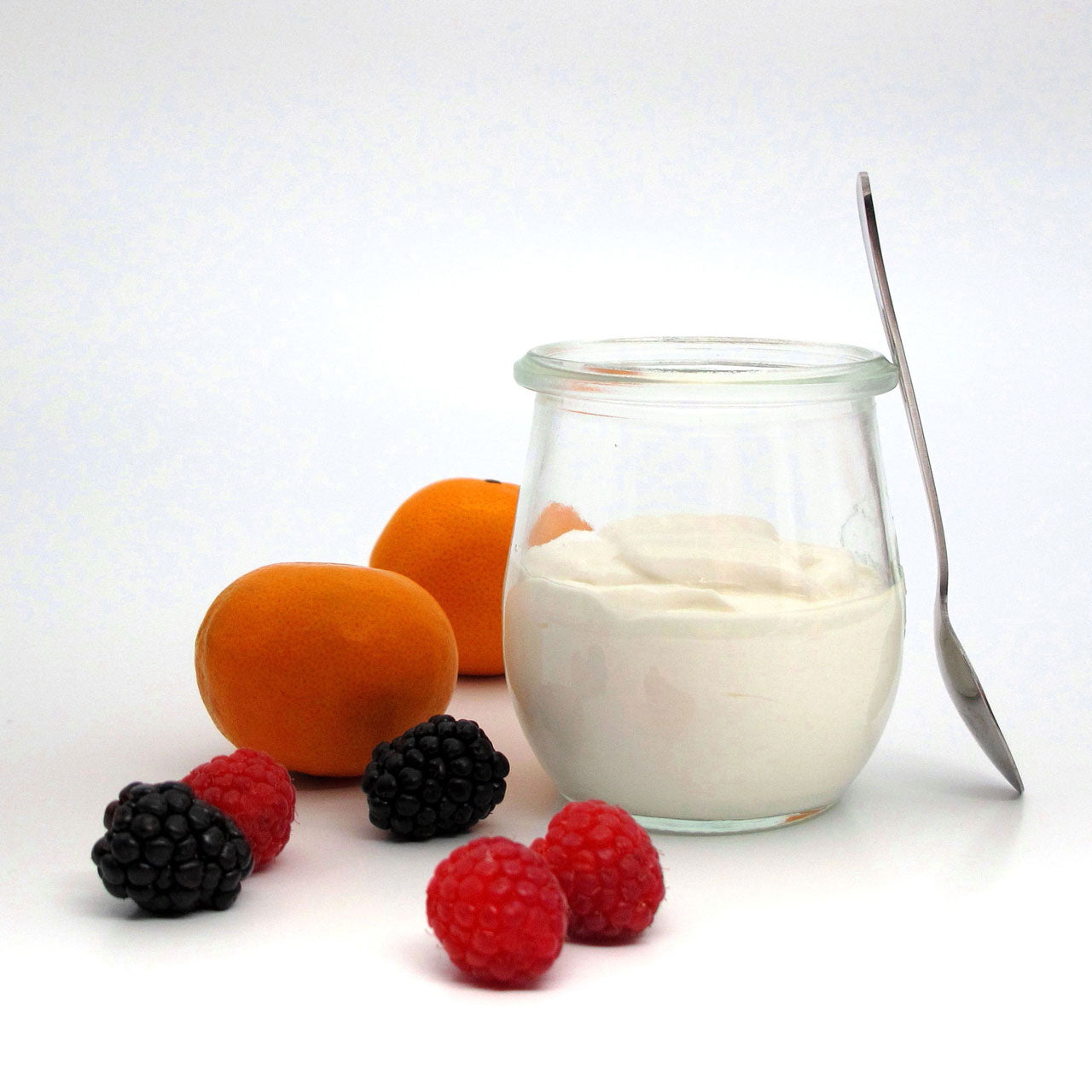 Jar of custard-style yogurt with fruit