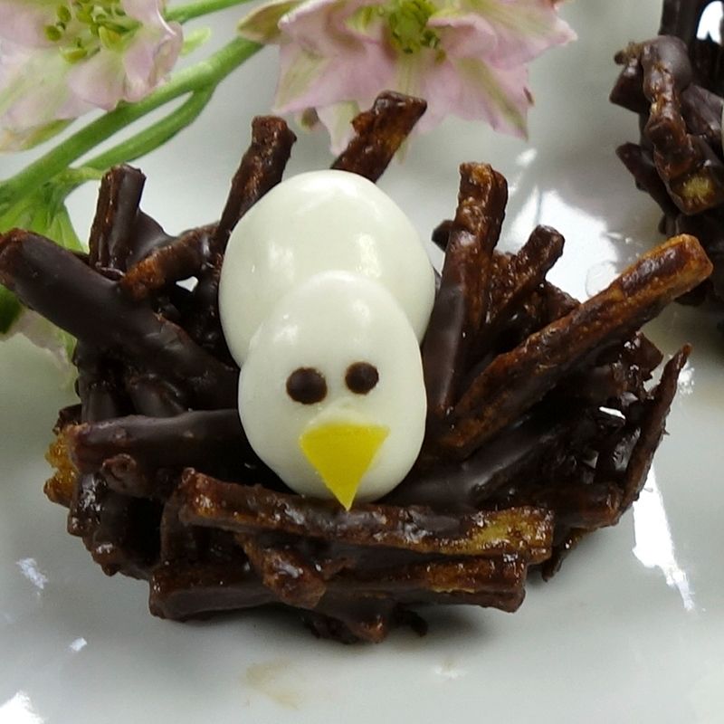Chocolate coated fried potatoes with white chocolate eggs