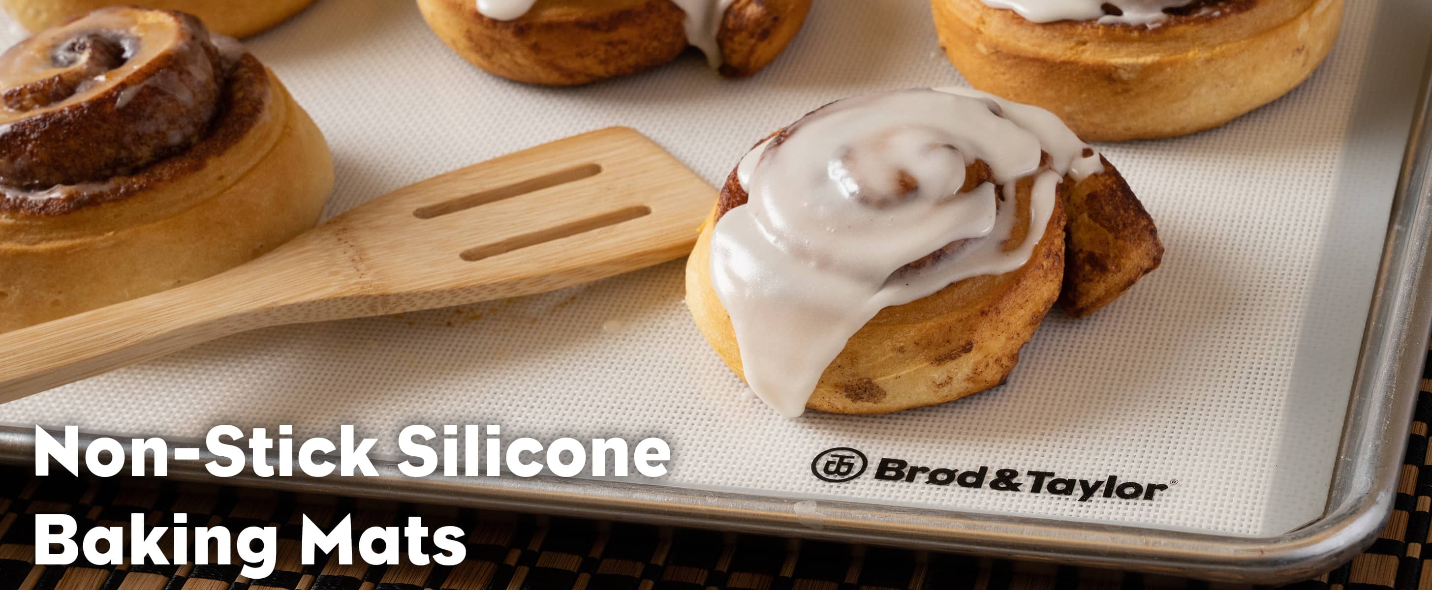 Brod & Taylor Silicone Baking Mat with cinnamon rolls on a baking pan