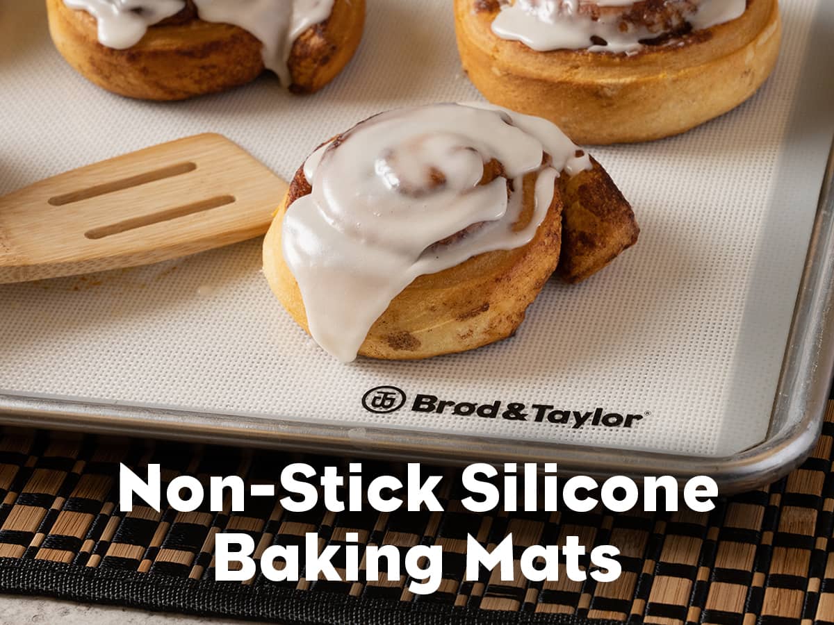 Brod & Taylor Silicone Baking Mat with cinnamon rolls on a baking pan