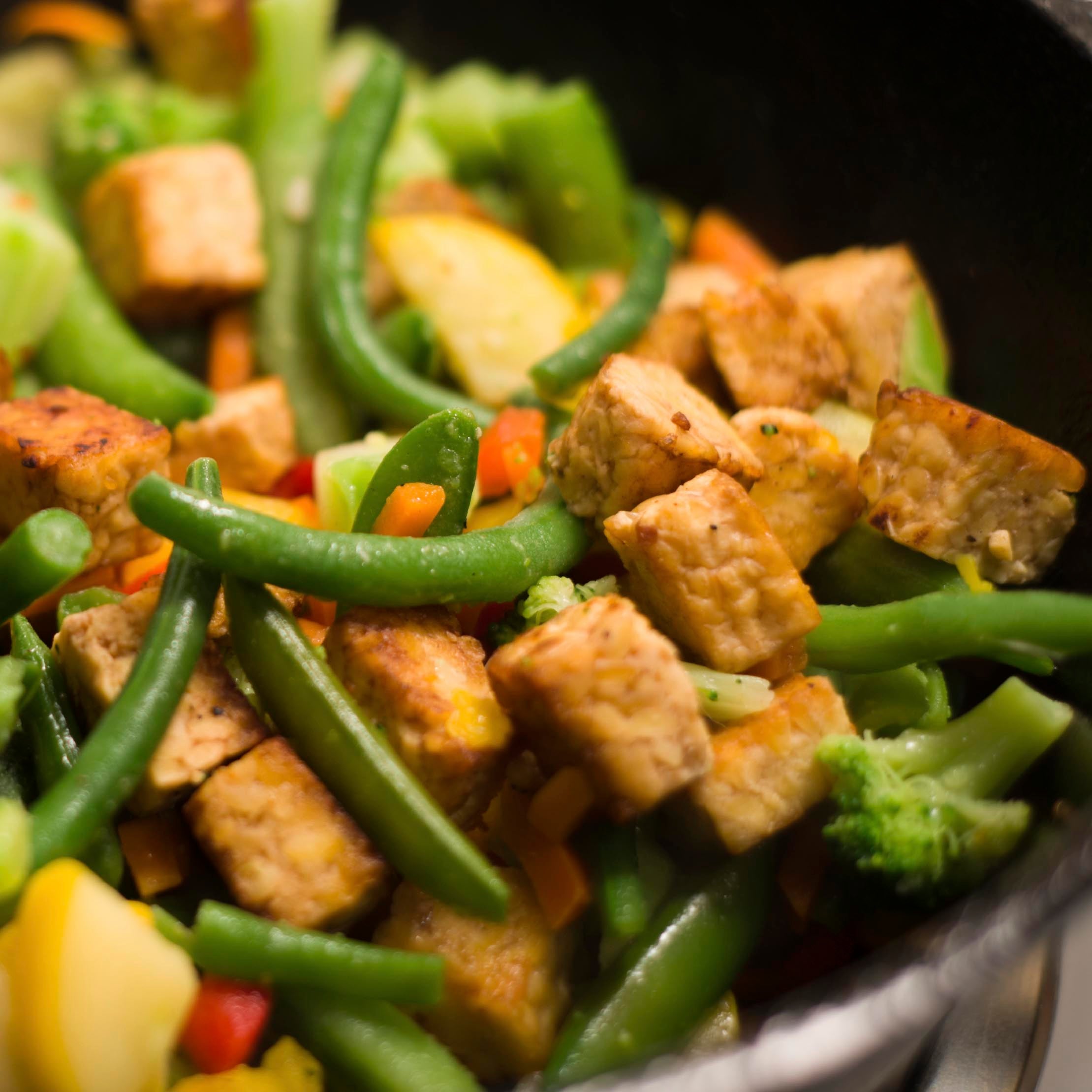Tempeh stir fry with string beans, broccoli and yellow squash